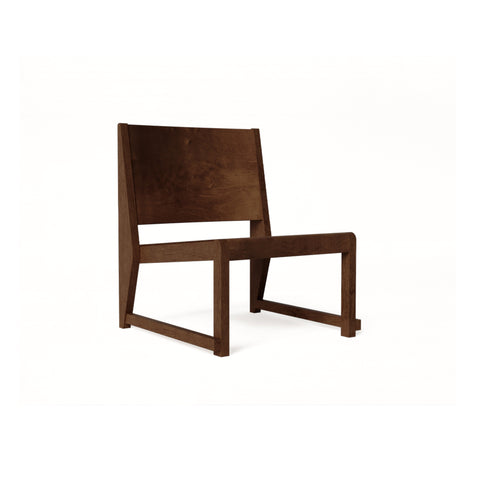 Frama Easy Chair 01 in Dark Brown Birch, low lounge chair with a wide angled back panel and open sled frame, front three quarter view on white