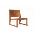 Frama Easy Chair 01 in Warm Brown Birch, low lounge chair with a wide angled back panel and open sled frame, front three quarter view on white