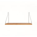 Frama Single Shelf in Natural Oak with stainless steel brackets, 15.7 inch wide shelf 7.9 inches deep, straight on view on white