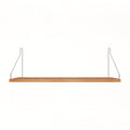Frama Single Shelf in Natural Oak with stainless steel brackets, 23.6 inch wide shelf 7.9 inches deep, straight on view on white