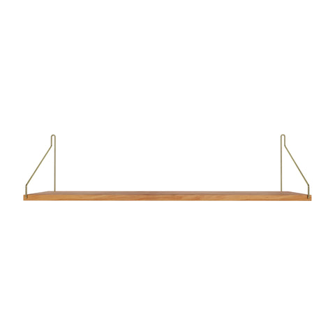 Frama Single Shelf in Natural Oak with brass brackets, 31.5 inch wide shelf 7.9 inches deep, straight on view on white