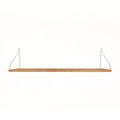 Frama Single Shelf in Natural Oak with stainless steel brackets, 31.5 inch wide shelf 7.9 inches deep, straight on view on white