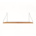 Frama Single Shelf in Natural Oak with stainless steel brackets, 23.6 inch wide shelf 10.6 inches deep, straight on view on white