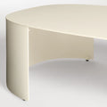 Bug Outdoor Coffee Table by Blu Dot in Ivory, curved leg and matte aluminum surface detail