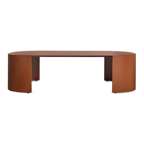 Bug Outdoor Coffee Table by Blu Dot in Rust powder-coated aluminum with rounded edges and curved legs, front view
