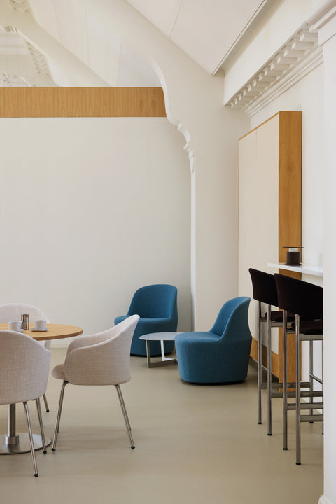 Blue Gomo Lounge Chairs in a contemporary hospitality lounge with café seating.