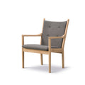 Front view of the Wegner 1788 Easy Chair in oak with upholstered seat