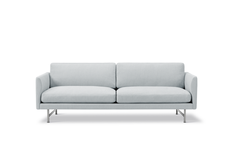minimalist scandinavian sofa with chrome legs and light fabric by fredericia furniture 