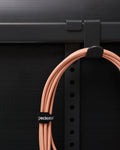 Pedestal Hook Mount in Charcoal, steel accessory hook, holding a coiled cable on the back of a stand