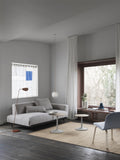 muuto side table with muuto sofa and muuto lighting