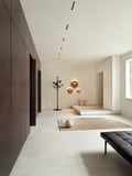 minimalist modern interior with corten color flindt wall lamp designed by christian flindt for louis poulsen