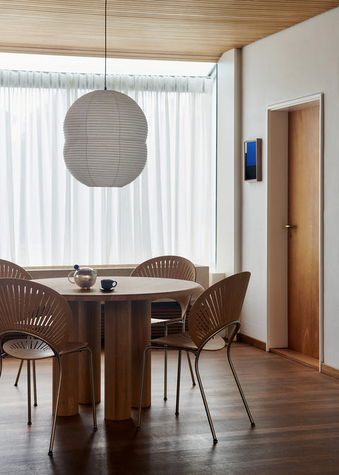 Trinidad dining chairs and islets dining table in scandinavian inspired dining room designed by fredericia furniture