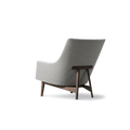 Back three quarter view of Fredericia Risom Lounge Chair 6540 showing sculpted back and walnut A frame support