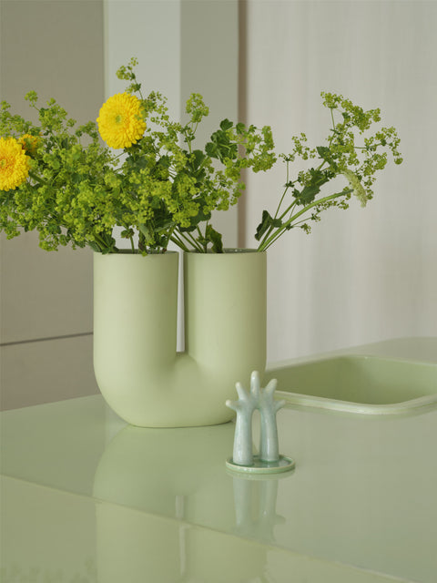 Muuto Kink Vase in modern living room decor with greenery