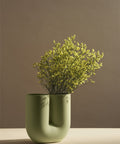 Stylish Muuto Kink Vase in bright Scandinavian-inspired living room