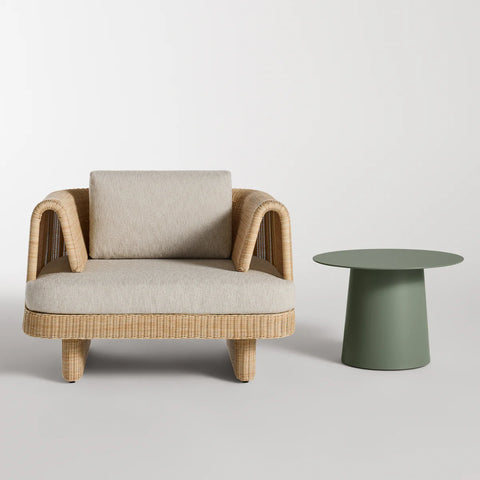 Loophole Outdoor Lounge Chair by Blu Dot in Sunbrella Stucco, front view with Circula side table