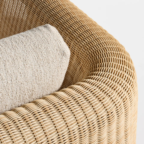 Loophole Outdoor Lounge Chair by Blu Dot, curved all-weather rattan back detail with Sunbrella Stucco cushion