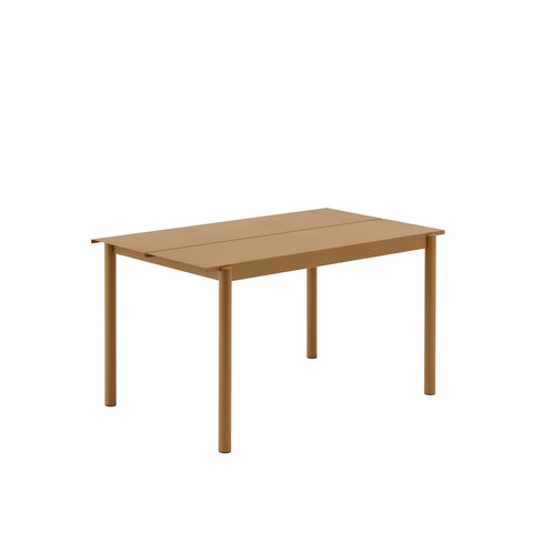 linear steel outdoor table by muuto in burnt orange