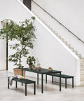 minimalist steel outdoor dining table and steel benches by muuto 