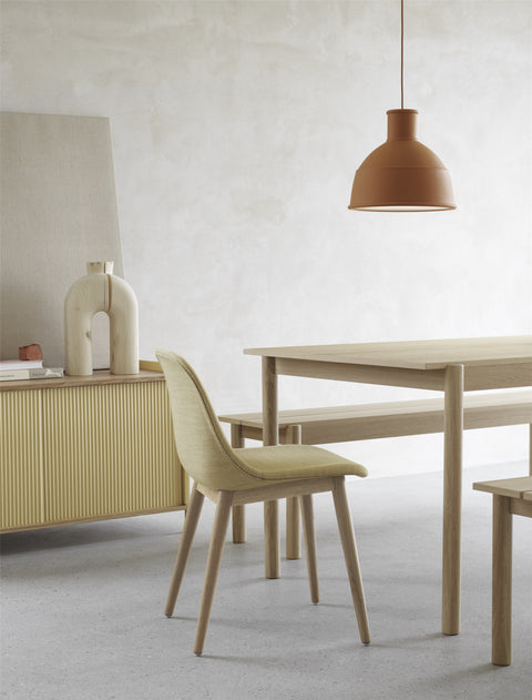 linear oak wood dining table and fiber dining chair by muuto