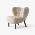 Little Petra VB1 by &Tradition in oiled walnut with Sheepskin Moonlight upholstery, a cozy Danish lounge chair.