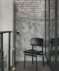 loft chair on apartment balcony designed by muuto