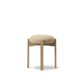 Pioneer Stool by Fredericia, oak base with rounded upholstered seat, front view