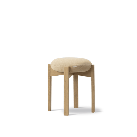 Pioneer Stool by Fredericia, oak frame with cushioned seat, three quarter angle
