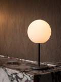 Audo Copenhagen TR Bulb Table Lamp in a styled interior