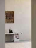 scandinavian entryway with a marble bench by audo copenhagen