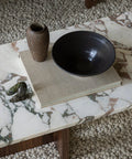 scandinavian home decor on a marble coffee table by audo copenhagen