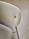 Audo Copenhagen Co Dining Chair, Without Arms, Fully Upholstered, detailed close-up of the fully upholstered Co Dining Chair, showing the textured cream Audo Bouclé fabric and chrome legs