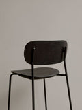 Audo Copenhagen Co Bar Chair, Non-Upholstered, rear close-up of the Co Bar Chair in dark stained oak veneer, focusing on the textured backrest and slim black metal frame
