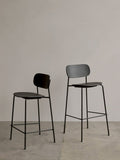 Audo Copenhagen Co Bar Chair, Non-Upholstered, the Co Counter Chair and Co Bar Chair, both in black oak veneer with black steel frames