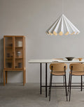 Audo Copenhagen Co Counter Chair, Non-Upholstered, minimalist dining room with two oak Co Counter Chairs at a Snaregade Table, a Dancing Pendant above and a Curiosity Cabinet