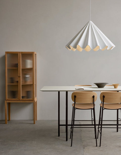Audo Copenhagen Co Counter Chair, Non-Upholstered, minimalist dining room with two oak Co Counter Chairs at a Snaregade Table, a Dancing Pendant above and a Curiosity Cabinet