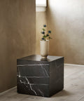 black marble end table designed by norm architects for audo copenhagen