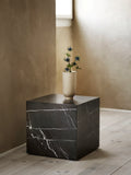 black marble end table designed by norm architects for audo copenhagen