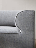 Close-up of Eave Modular Sofa armrest in textured grey upholstery