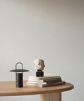 black portable table lamp by audo copenhagen