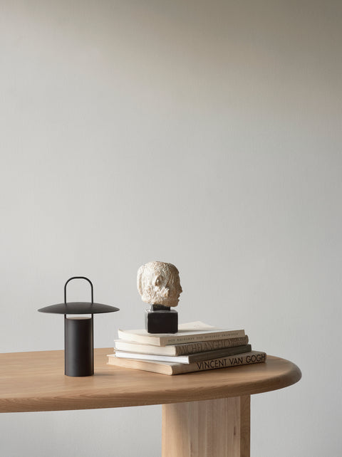 black portable table lamp by audo copenhagen