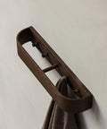 dark stained oak coat rack by audo copenhagen