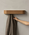 scandinavian coat rack in dark oak by audo copenhagen