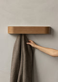 scandinavian coat rack in dark oak by audo copenhagen