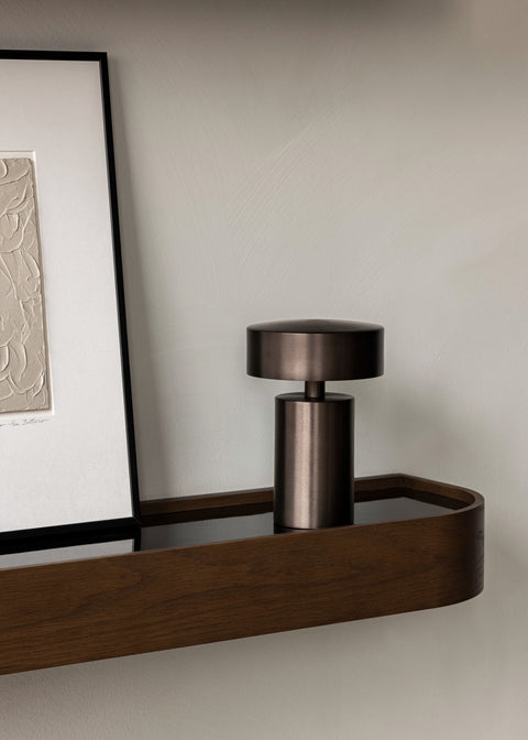 bronze column table lamp portable designed by norm architects for audo copenhagen