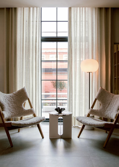 knitting chairs by ib kofod larsen in a mid century modern seating area 