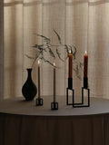 decorative candle holder on a tabletop for audo copenhagen