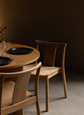 natural oak merkur dining chair with arms and dakar leather seat designed by Skogstad & Wærnes for audo copenhagen