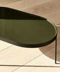 nono coffee table in dark green finish designed by norm architects for audo copenhagen