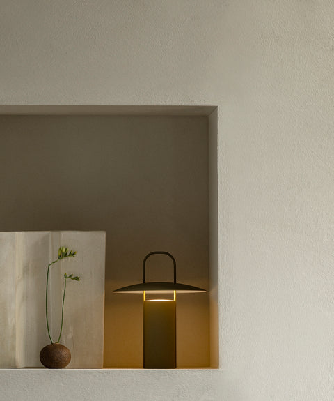 black portable table lamp by audo copenhagen